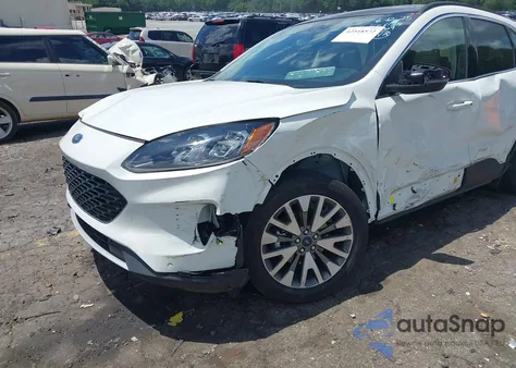 2020 Ford Escape Titanium Hybrid from USA, damaged, VIN 1FMCU9DZ7LUB56124